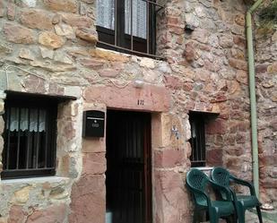 Vista exterior de Casa adosada en venda en Lamasón amb Jardí privat, Terrassa i Traster