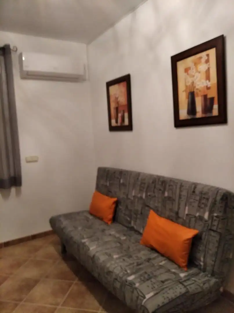 Sala d'estar de Casa adosada en venda en Ítrabo amb Aire condicionat i Terrassa