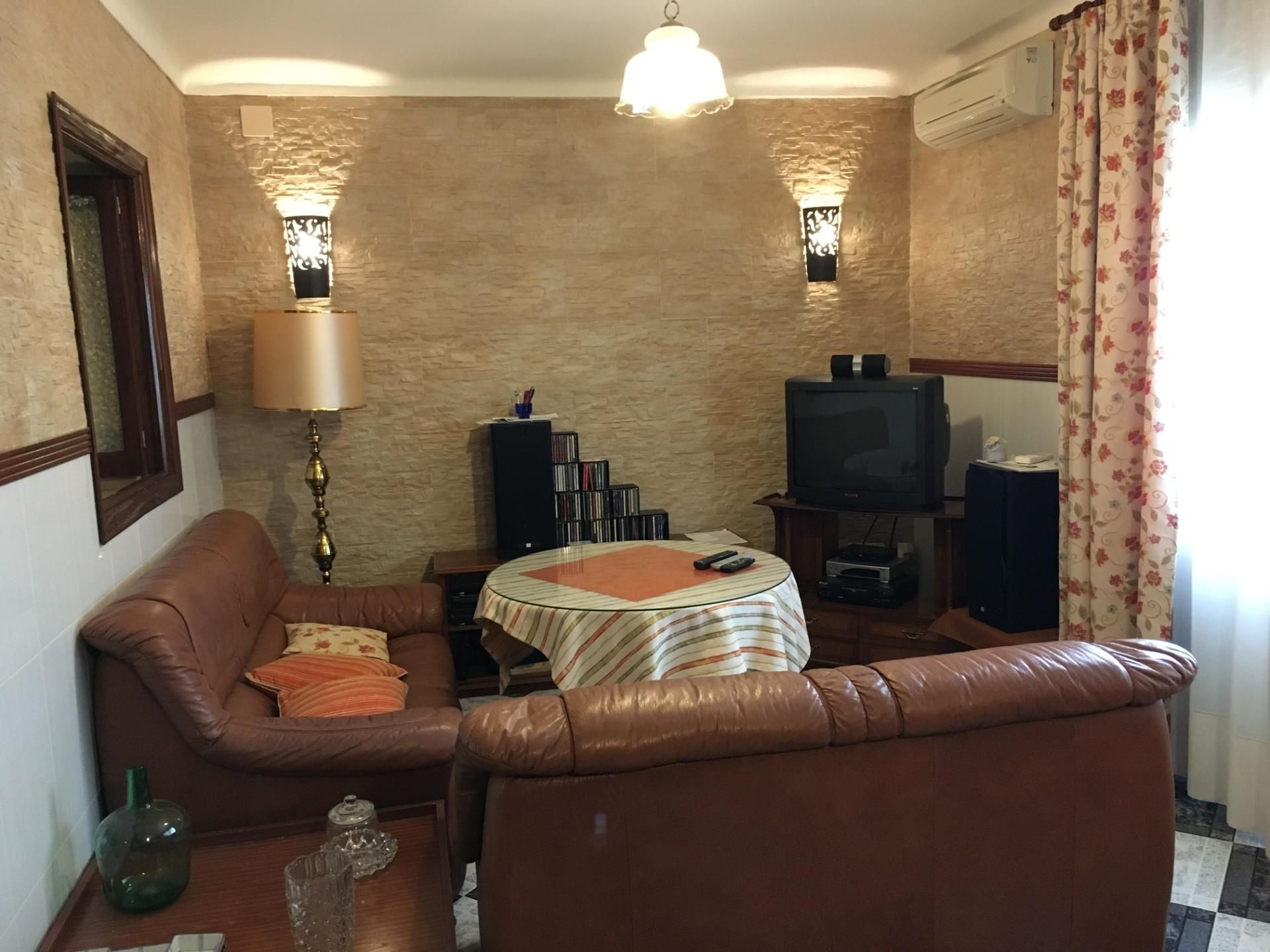 Sala d'estar de Casa adosada en venda en Peñarroya-Pueblonuevo amb Aire condicionat i Terrassa