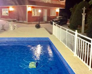 Swimming pool of House or chalet for sale in A Cañiza    with Air Conditioner, Heating and Private garden