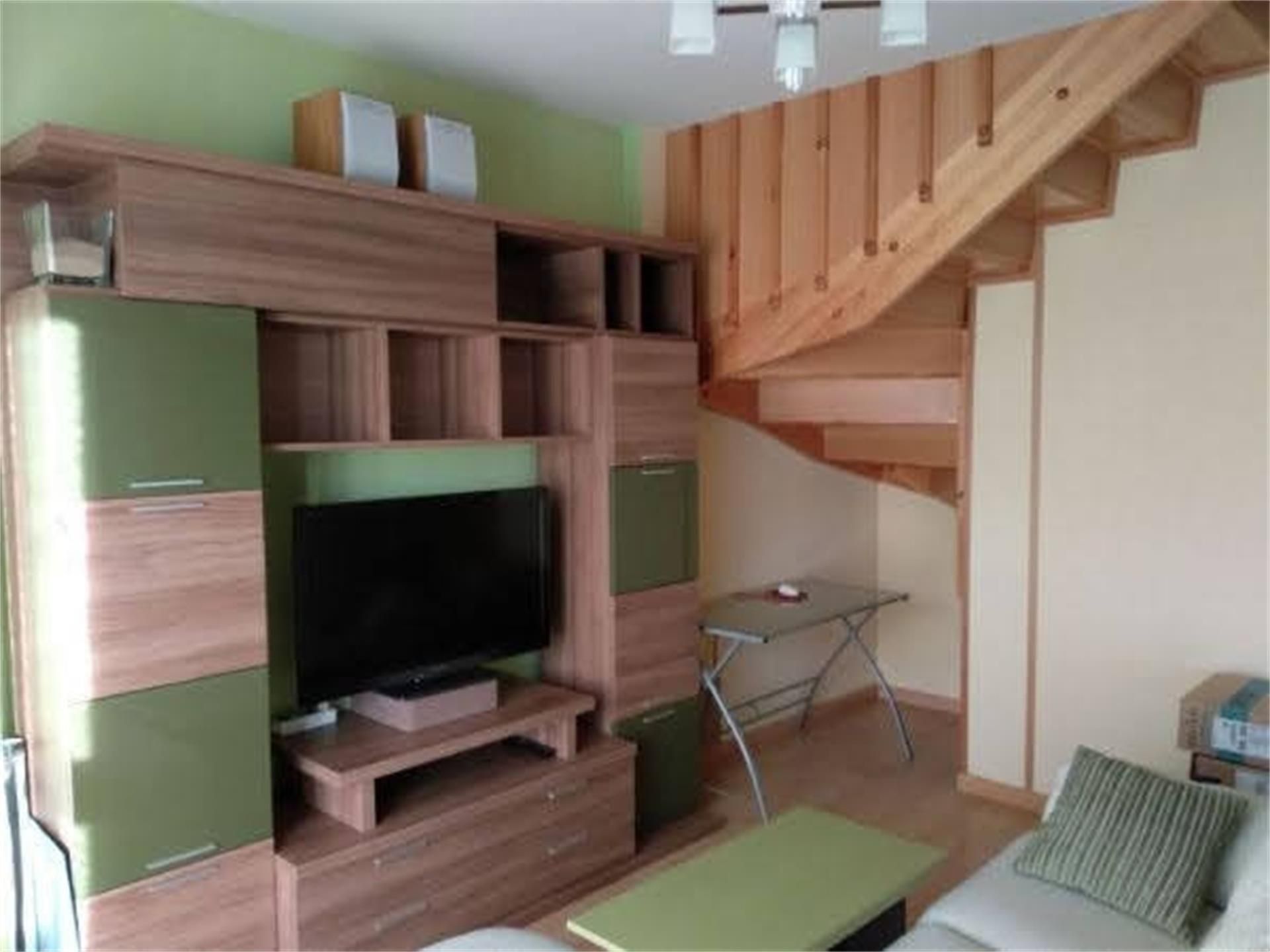 Sala d'estar de Dúplex en venda en Villaquilambre amb Calefacció, Jardí privat i Parquet