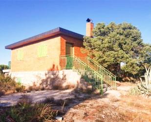 Exterior view of Country house for sale in El Berrueco  with Terrace and Swimming Pool