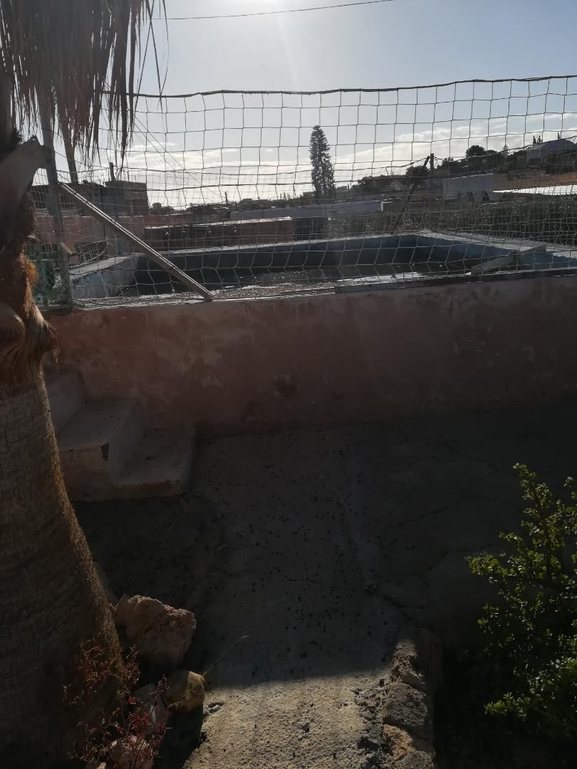 Swimming pool of Single-family semi-detached for sale in  Almería Capital  with Air Conditioner