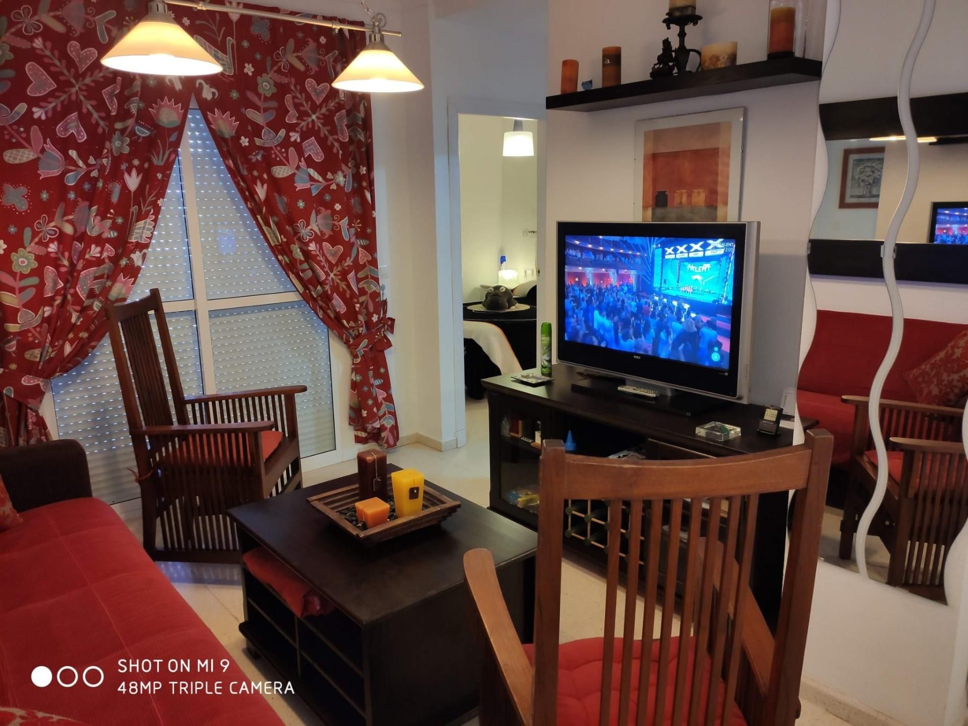 Sala d'estar de Apartament de lloguer en Isla Cristina amb Terrassa, Moblat i Rentadora