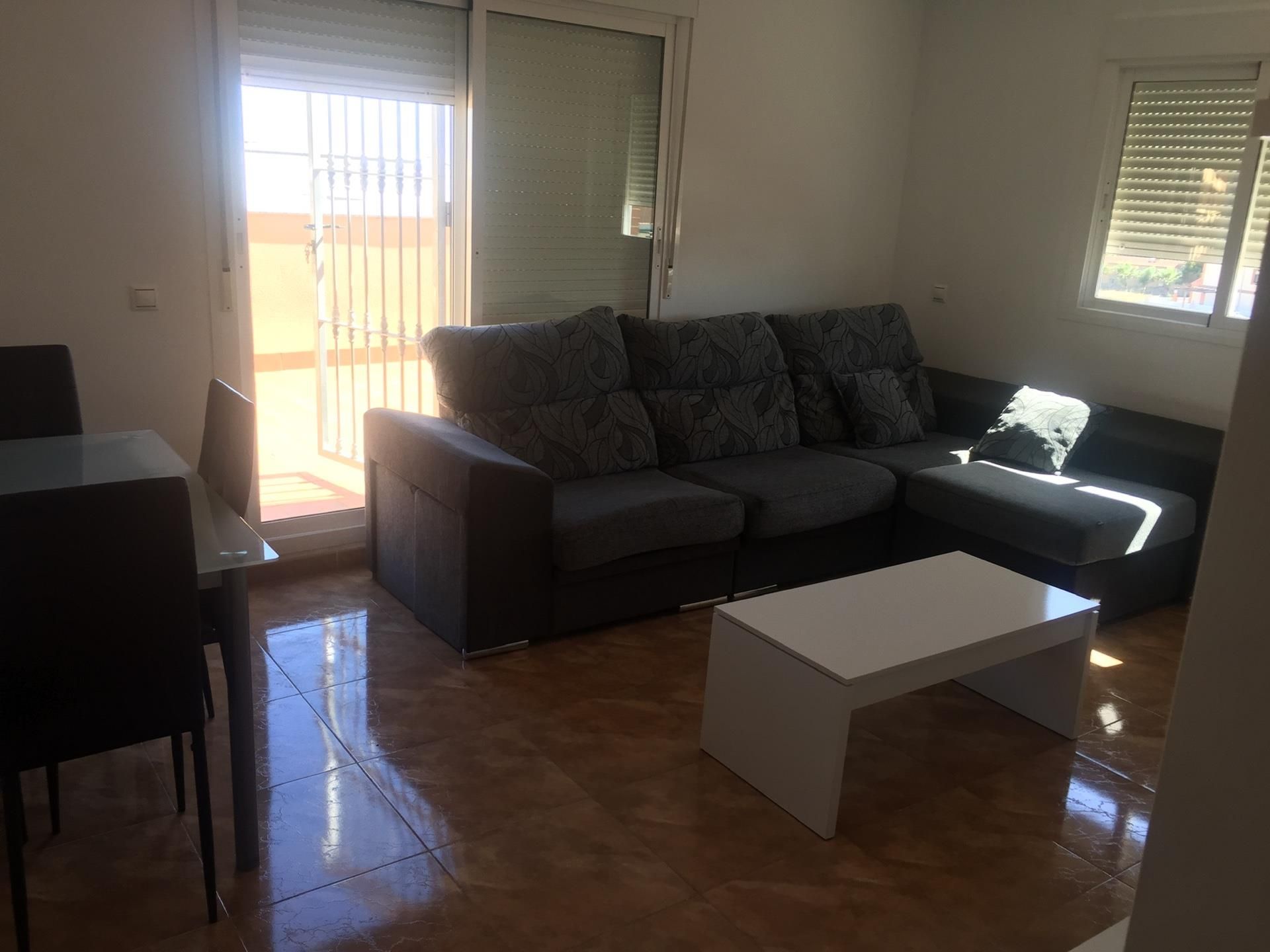 Living room of Flat for sale in Roquetas de Mar  with Air Conditioner, Terrace and Storage room