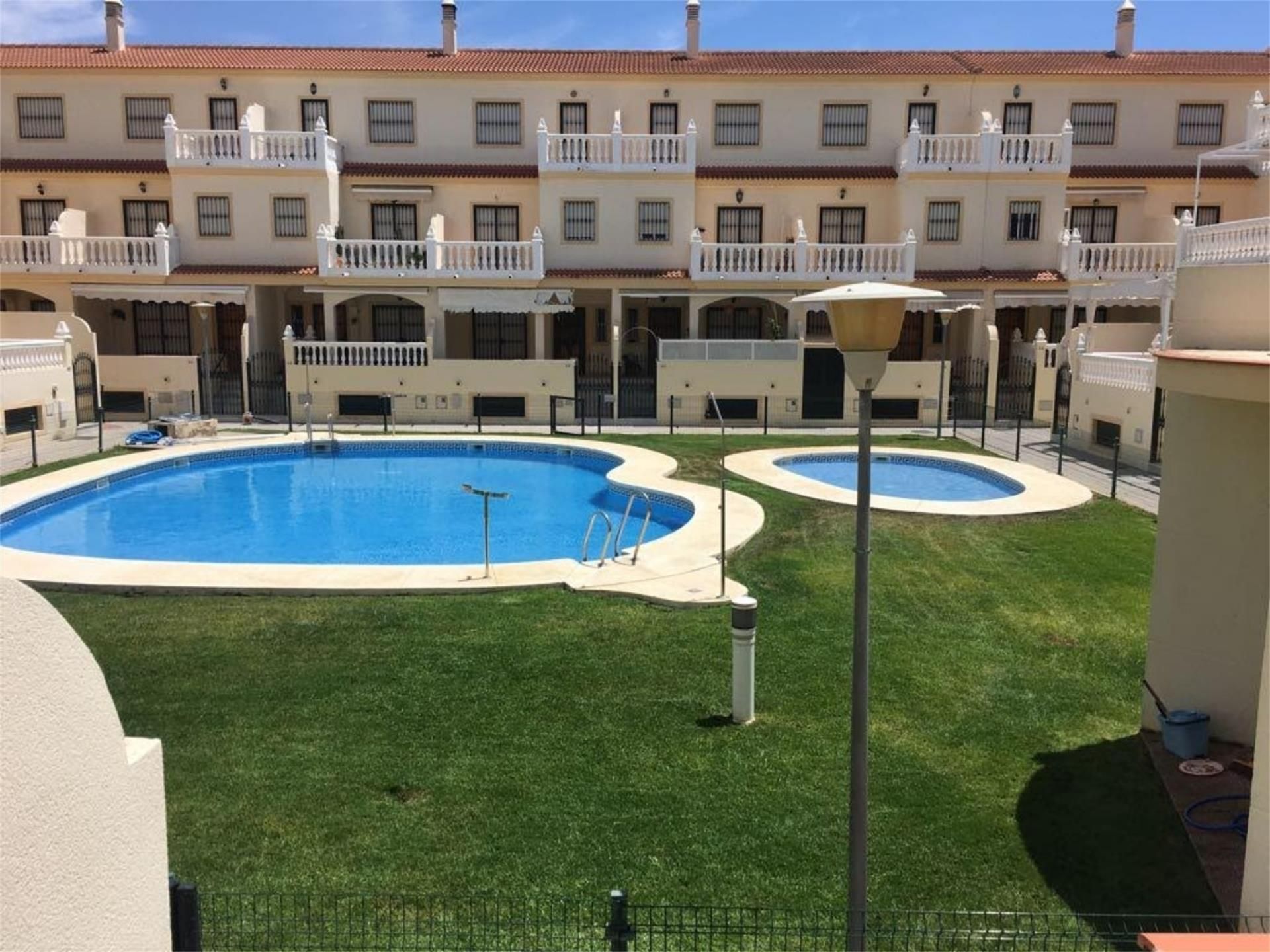 Swimming pool of Flat to rent in La Antilla  with Air Conditioner, Heating and Private garden