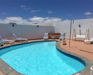 Swimming pool of Single-family semi-detached for sale in Arrecife  with Air Conditioner, Private garden and Terrace