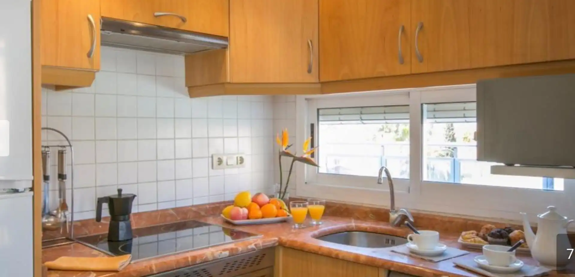 Cocina de Apartamento de alquiler en Oliva con Aire acondicionado, Jardín privado y Piscina
