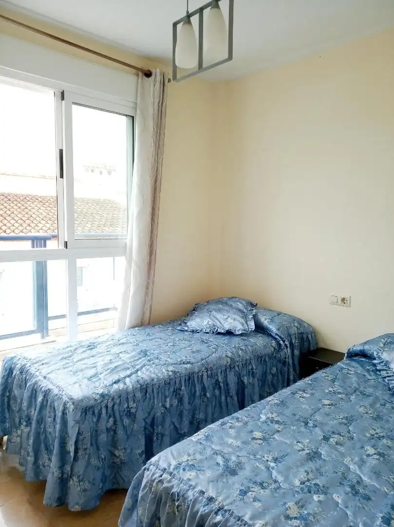 Habitación de Apartamento de alquiler en Oliva con Aire acondicionado, Jardín privado y Piscina