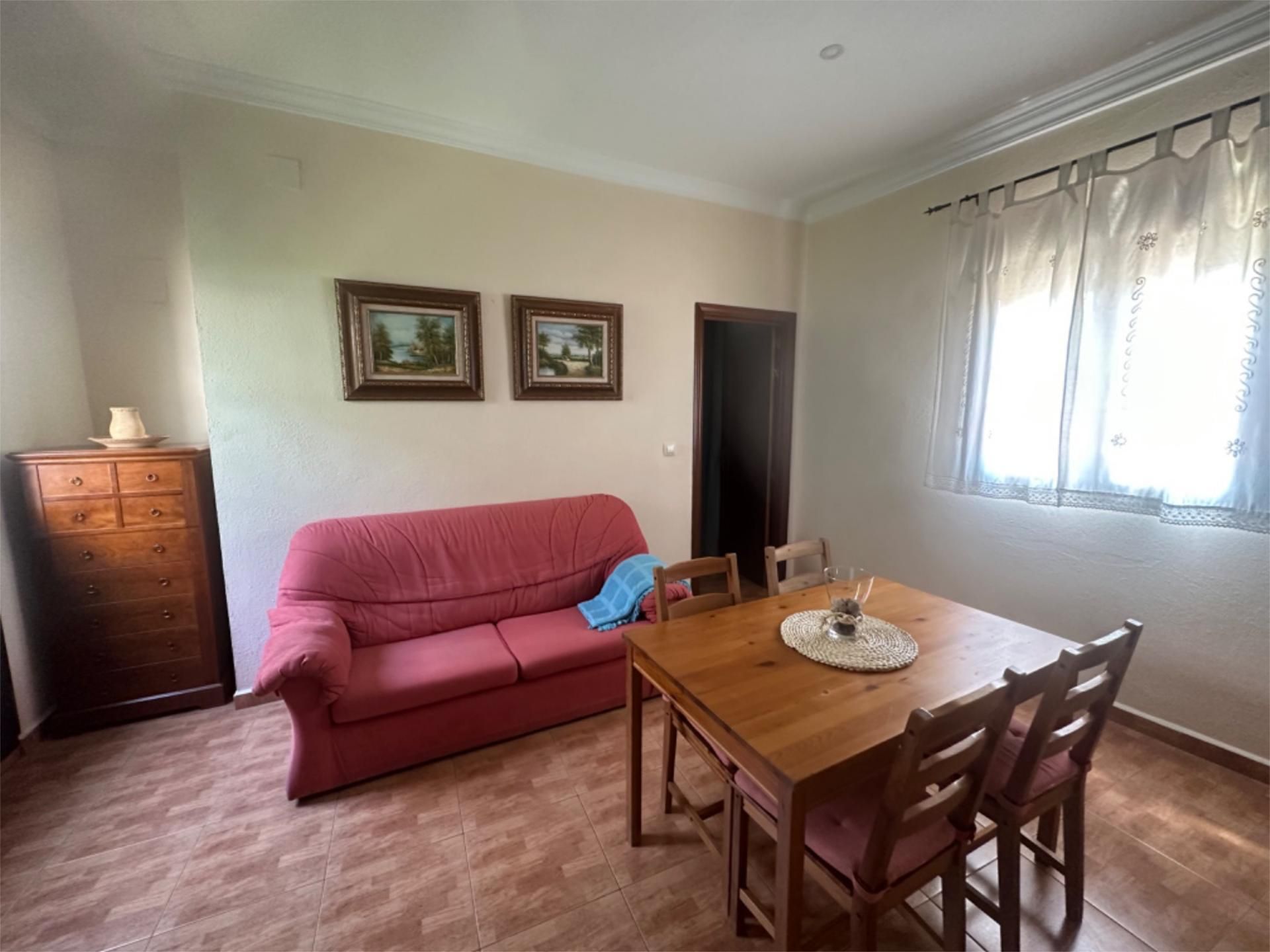 Sala d'estar de Apartament de lloguer en Guadalcanal amb Aire condicionat, Rentadora i Microones