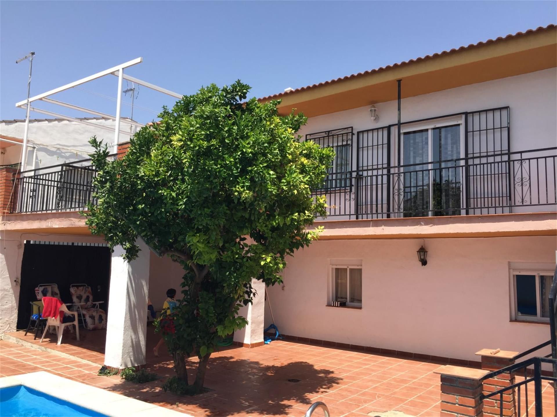 Exterior view of Single-family semi-detached for sale in Gójar  with Terrace, Swimming Pool and Balcony
