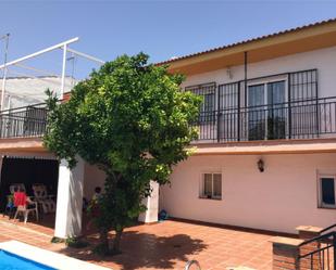 Exterior view of Single-family semi-detached for sale in Gójar  with Terrace, Swimming Pool and Balcony