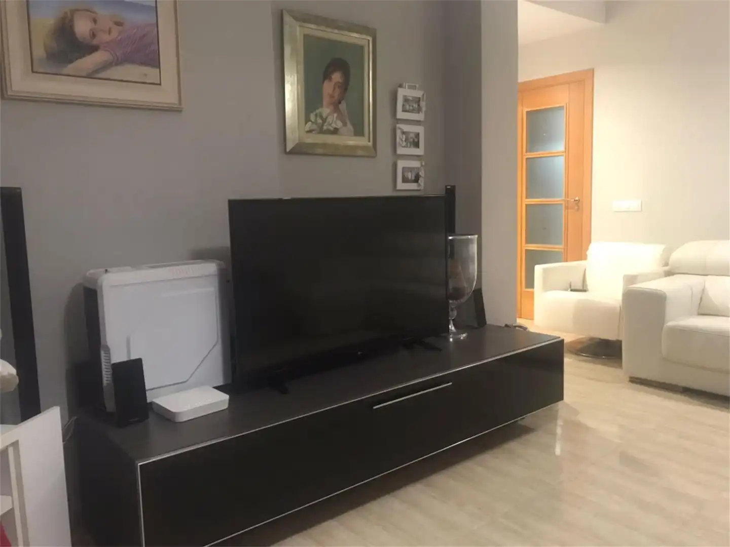 Sala de estar de Casa adosada en venta en Tomelloso con Aire acondicionado, Calefacción y Amueblado
