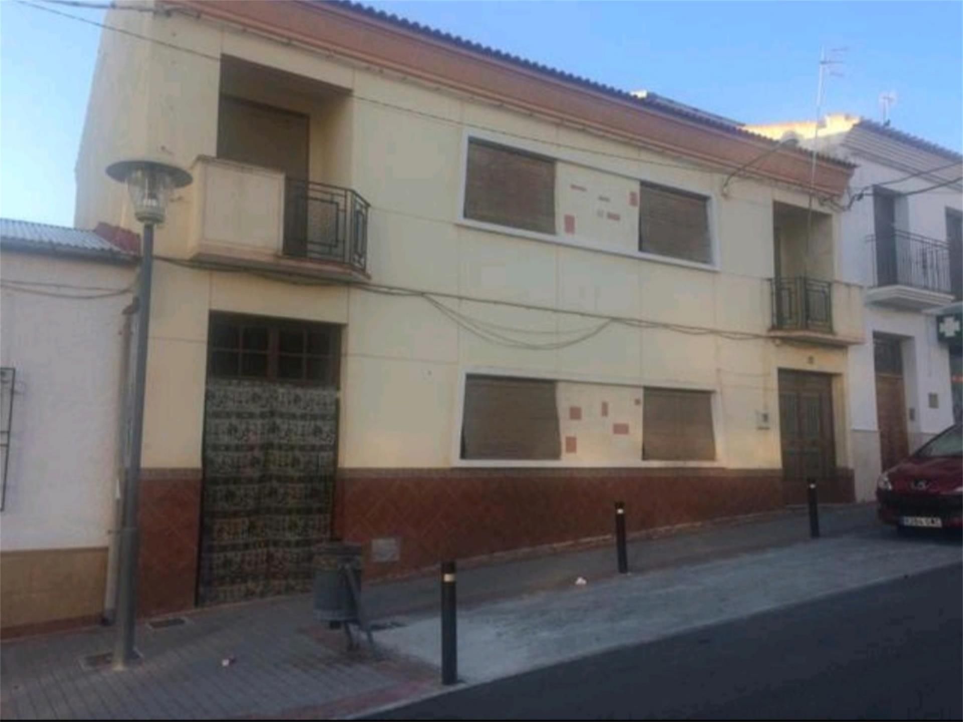 Vista exterior de Casa adosada en venda en Moraleda de Zafayona amb Jardí privat i Traster