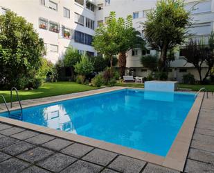 Swimming pool of Flat for sale in  Granada Capital  with Air Conditioner, Terrace and Swimming Pool