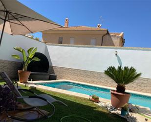 Swimming pool of House or chalet for sale in Utrera  with Air Conditioner, Terrace and Swimming Pool