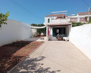 Exterior view of Single-family semi-detached for sale in Es Castell  with Air Conditioner and Terrace