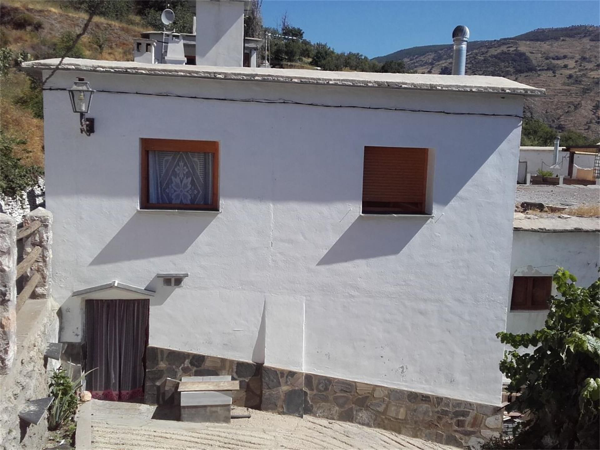 Exterior view of Single-family semi-detached for sale in Alpujarra de la Sierra  with Heating, Furnished and Oven