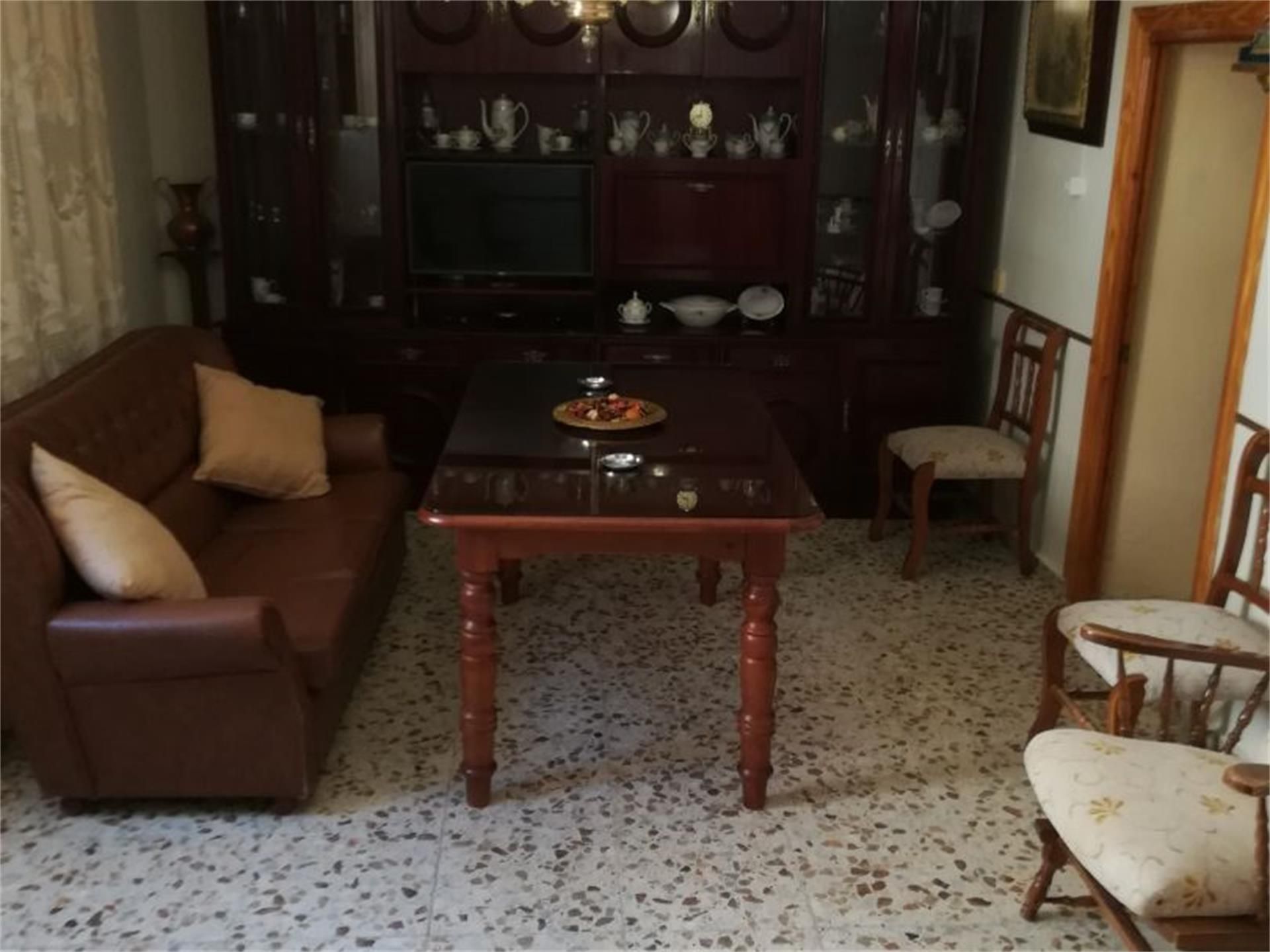 Sala d'estar de Casa adosada en venda en Antequera amb Aire condicionat i Terrassa