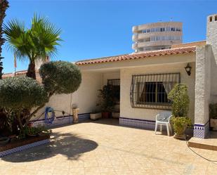 Exterior view of Single-family semi-detached for sale in La Manga del Mar Menor  with Air Conditioner and Terrace