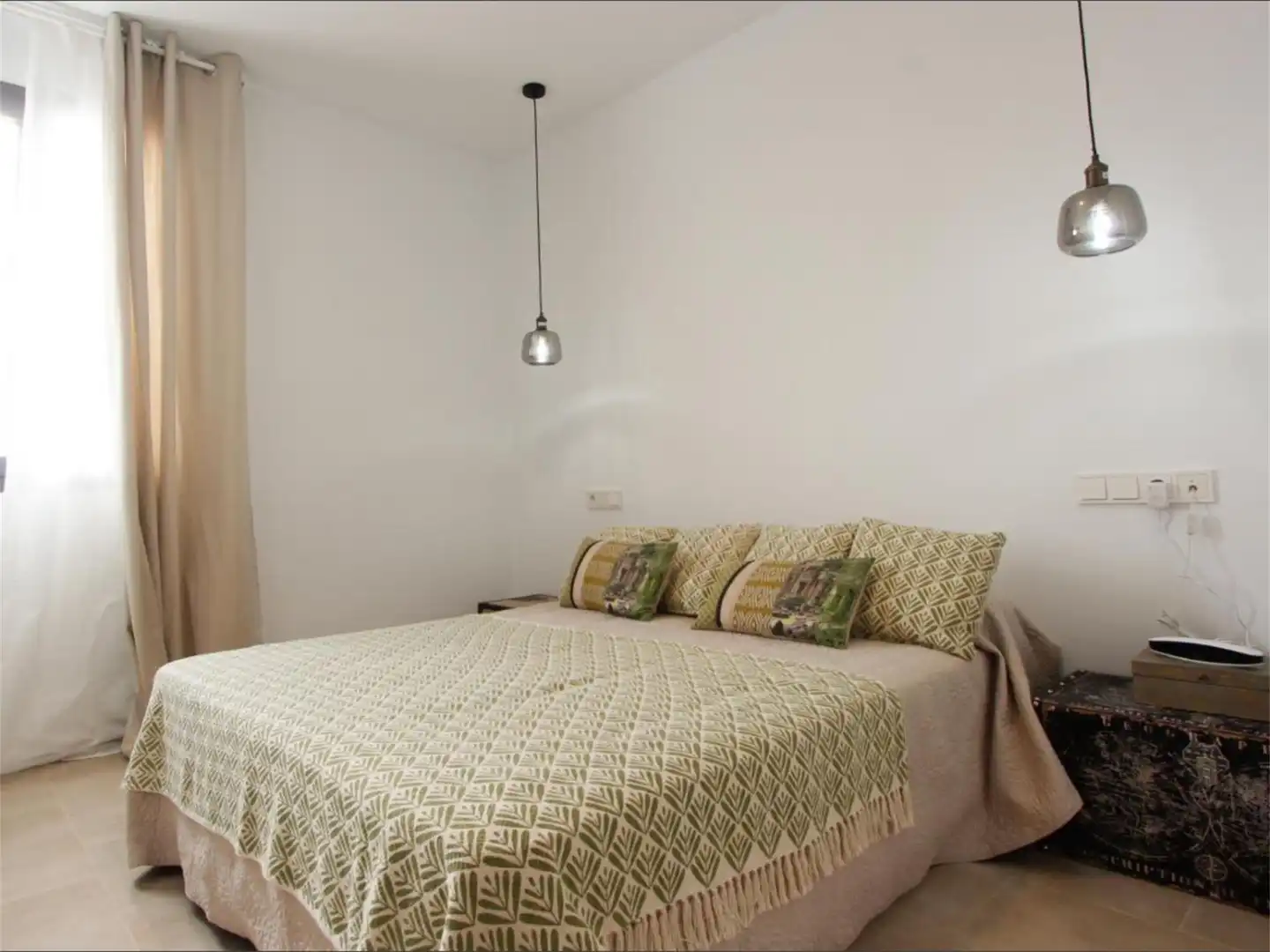 Dormitori de Pis de lloguer en Conil de la Frontera amb Aire condicionat, Jardí privat i Terrassa