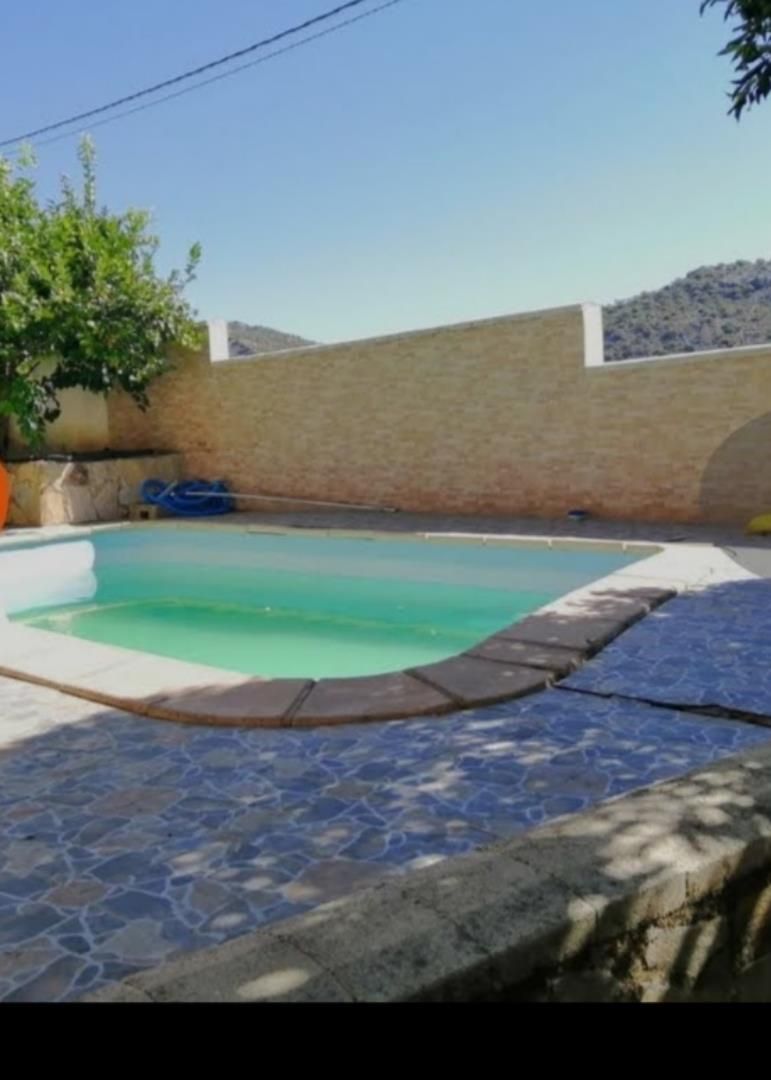 Piscina de Finca rústica en venda en Benaoján amb Aire condicionat, Calefacció i Jardí privat