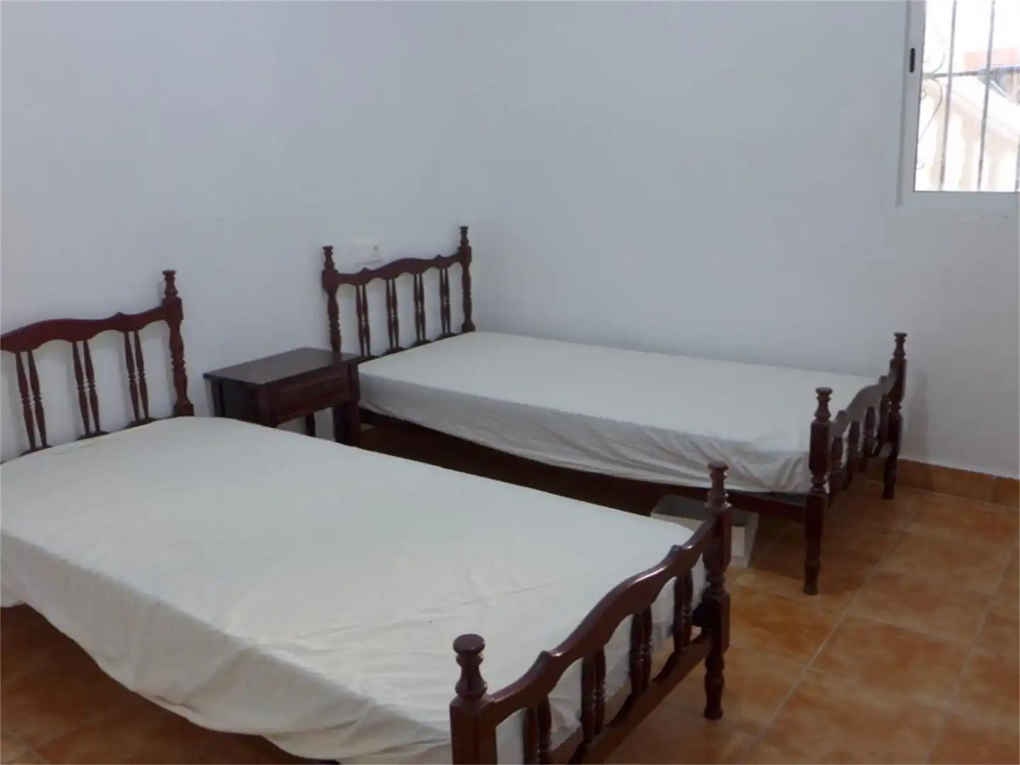 Einfamilien-Reihenhaus zum Verkauf in Calle Priego, Cabra Schlafzimmer von Einfamilien-Reihenhaus zum Verkauf in Cabra mit Privatgarten, Terrasse und Abstellraum