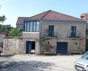 Vista exterior de Casa o xalet en venda en Leiro amb Aire condicionat, Terrassa i Balcó