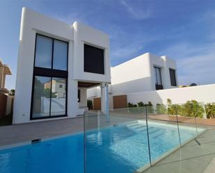 Exterior view of House or chalet for sale in L'Alfàs del Pi  with Air Conditioner, Terrace and Swimming Pool