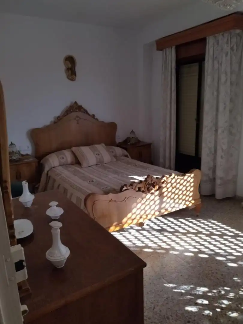 Einfamilien-Reihenhaus zum Verkauf in Calle Cortes Españolas, 16, Puente Genil Schlafzimmer von Einfamilien-Reihenhaus zum Verkauf in Puente Genil mit Klimaanlage und Heizung