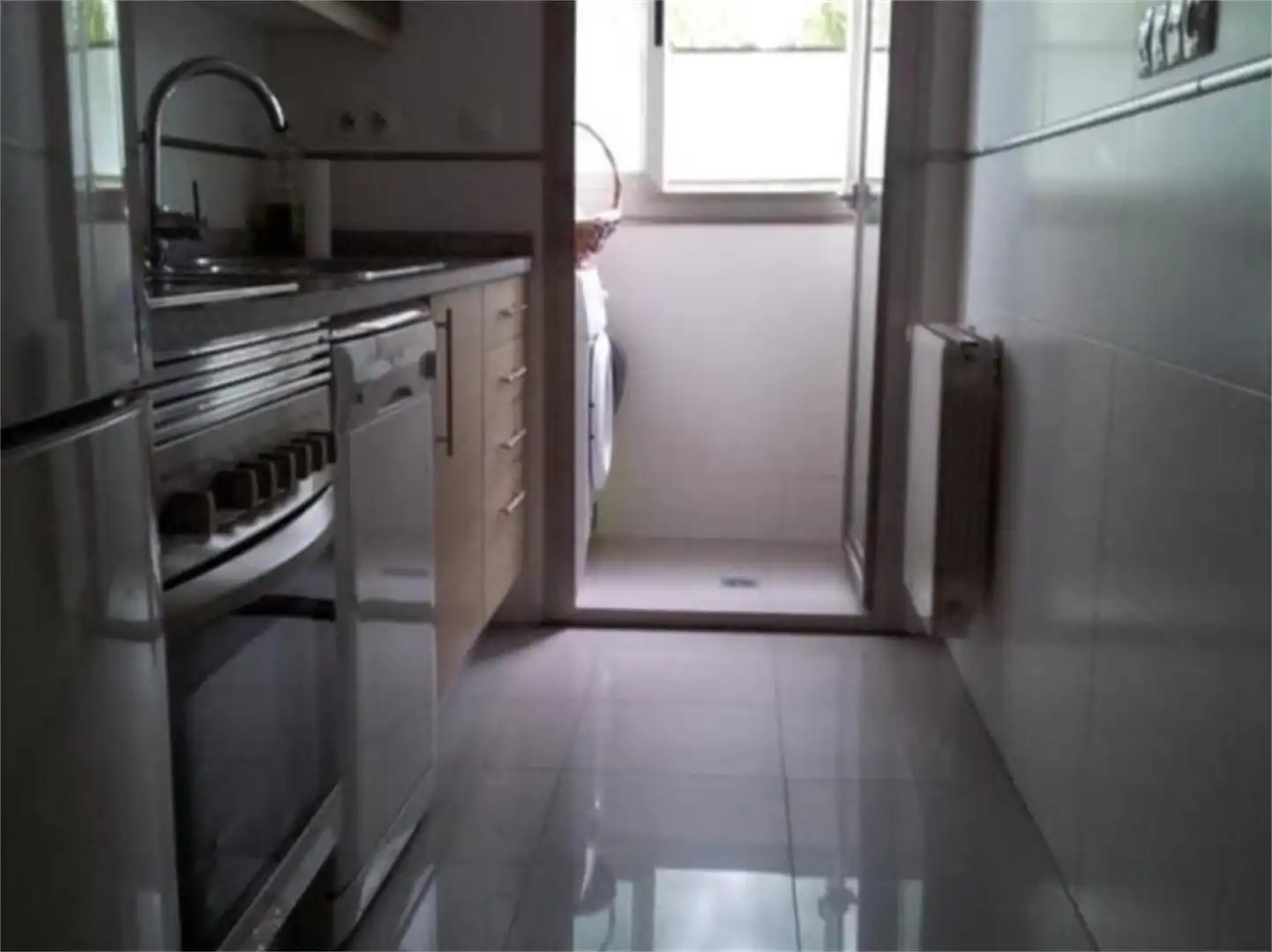 Pis de lloguer a Calle Nebulosas, Delicias Cuina de Pis de lloguer en Madrid amb Aire condicionat, Calefacció i Jardí privat