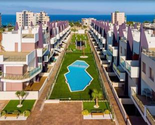 Vista exterior de Dúplex de lloguer en Pilar de la Horadada amb Aire condicionat, Terrassa i Piscina