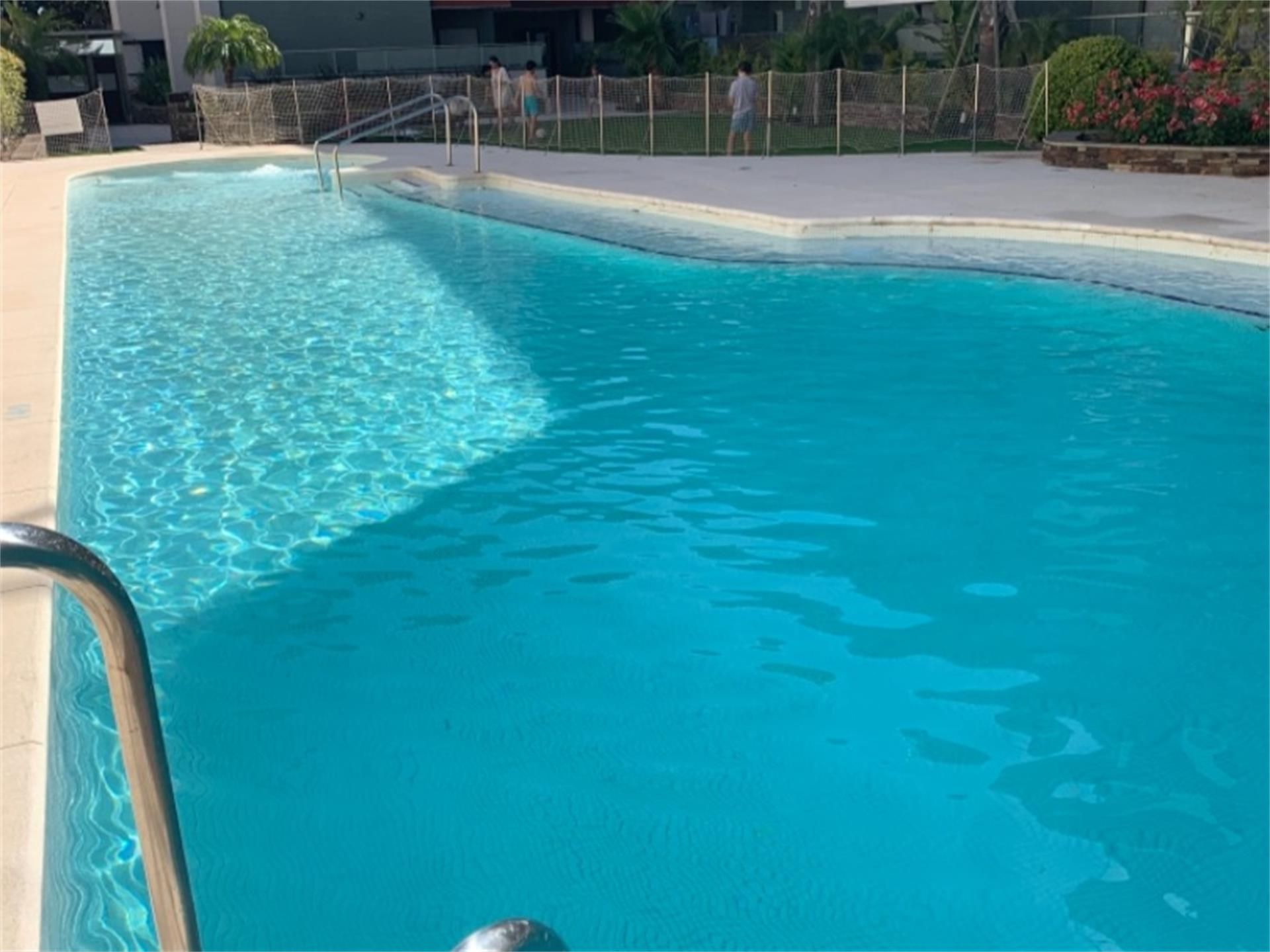 Swimming pool of Flat to rent in Rota  with Air Conditioner, Heating and Private garden