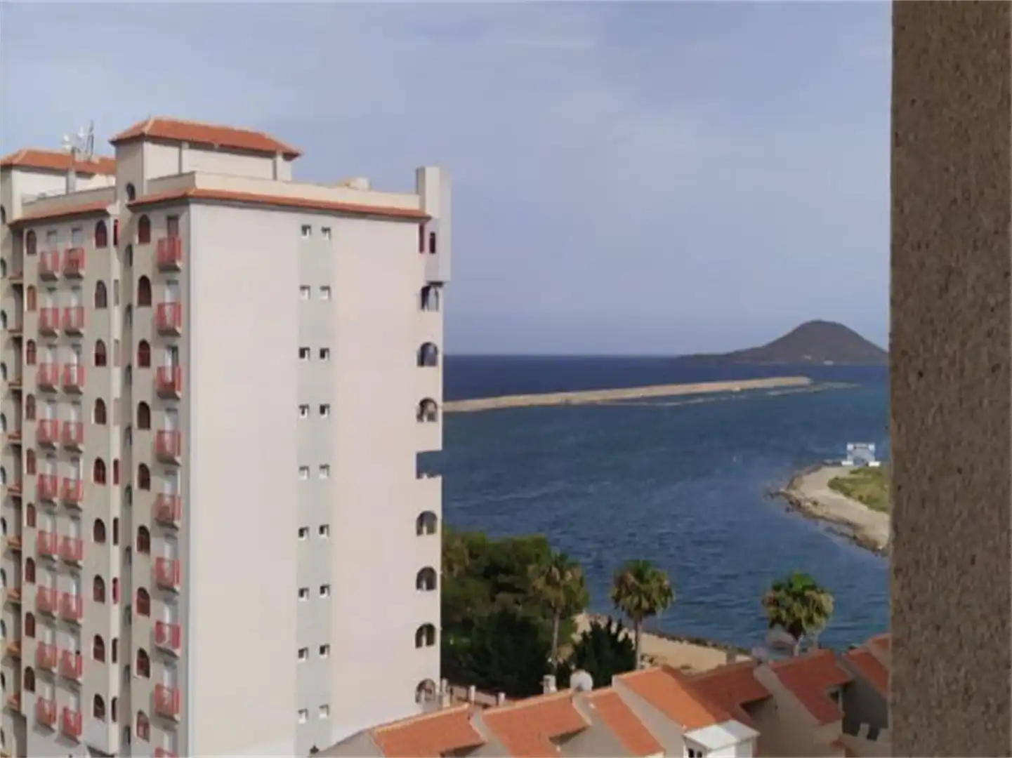 Dormitori de Pis de lloguer en La Manga del Mar Menor amb Jardí privat, Terrassa i Piscina