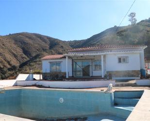 Exterior view of Country house for sale in Málaga Capital  with Air Conditioner, Terrace and Swimming Pool