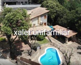 Exterior view of House or chalet for sale in Montagut i Oix  with Terrace and Swimming Pool