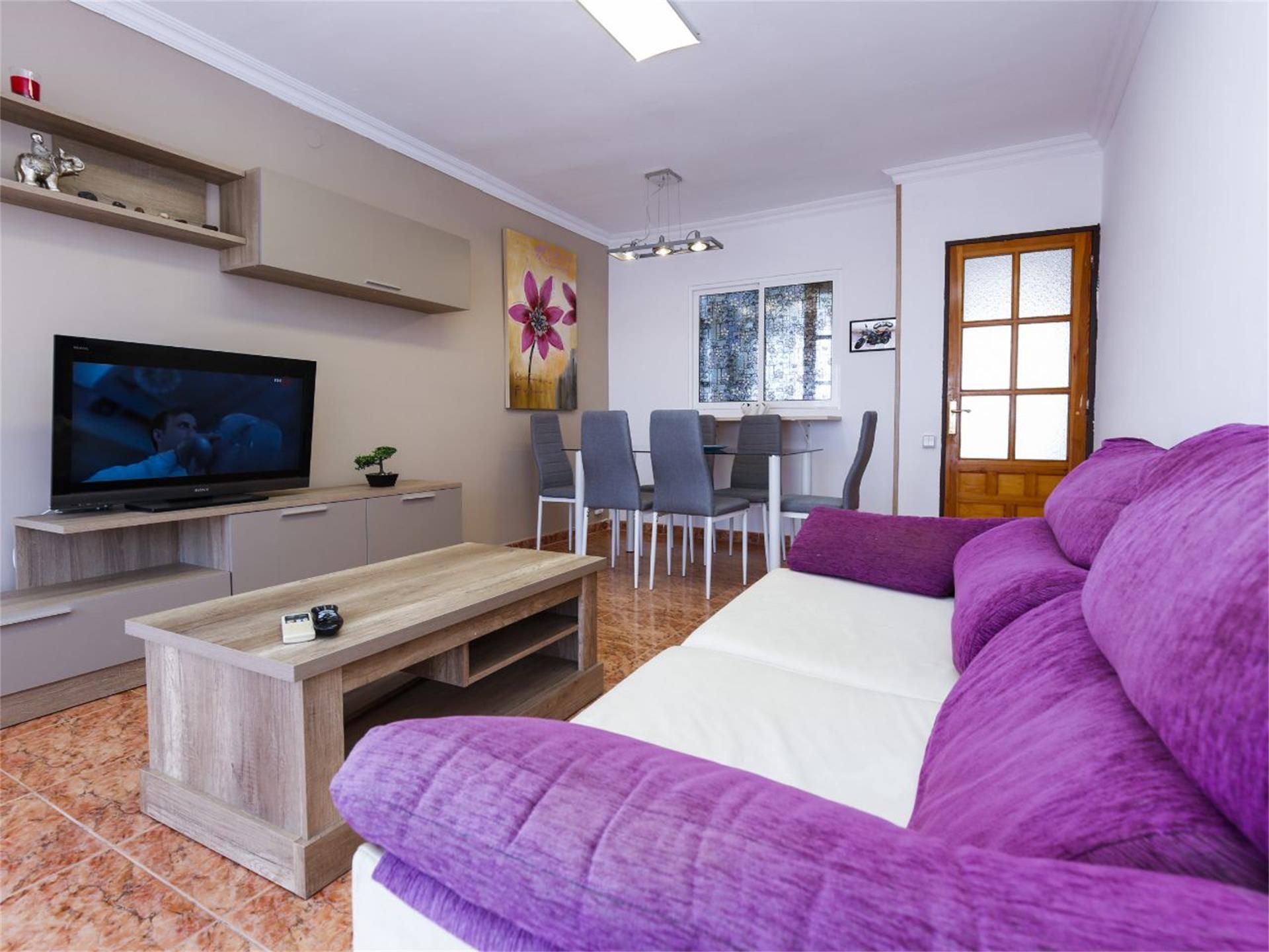 Living room of Apartment to rent in Salou  with Air Conditioner, Heating and Private garden