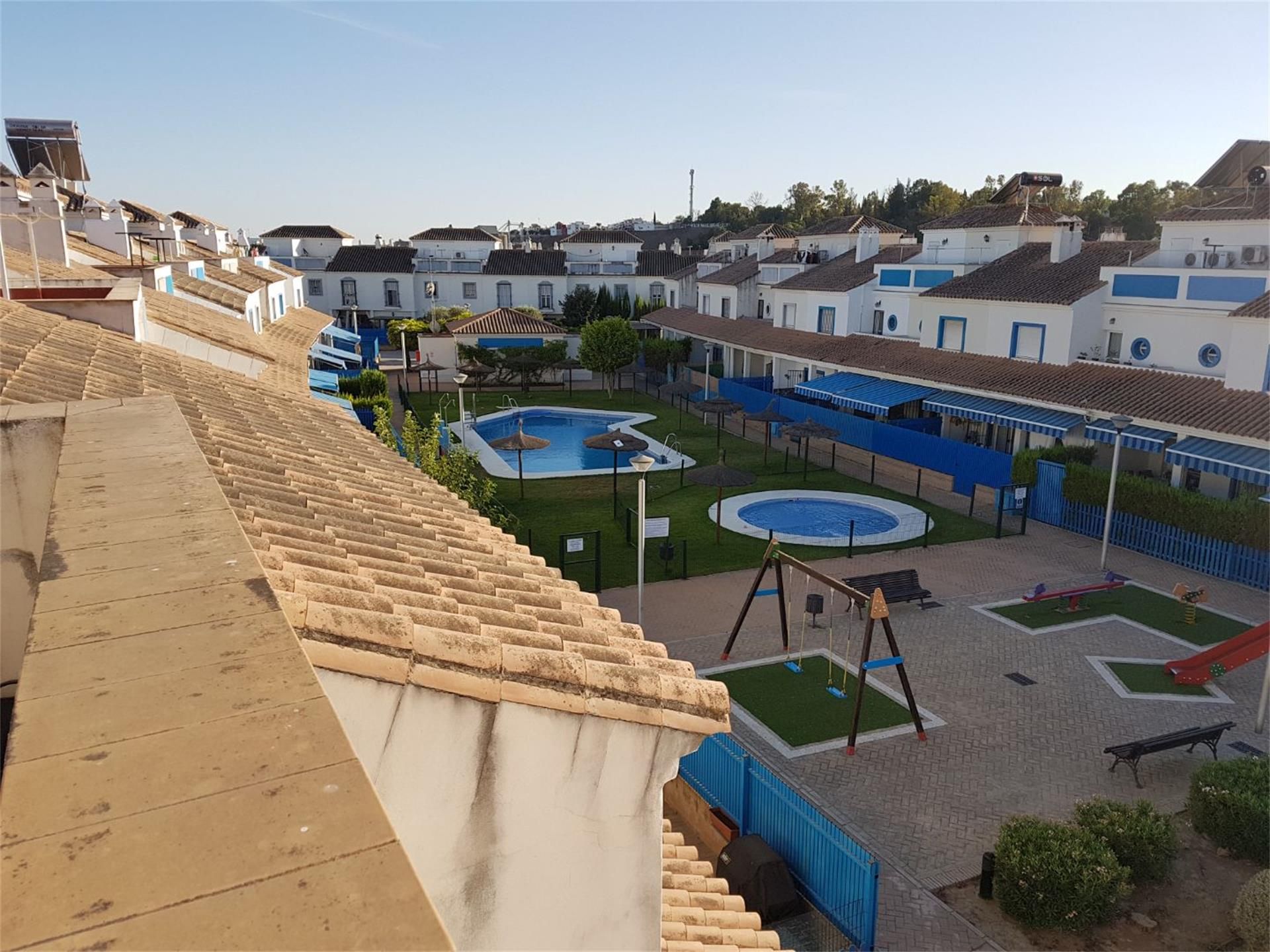 Exterior view of Flat for sale in Coria del Río  with Air Conditioner, Terrace and Swimming Pool