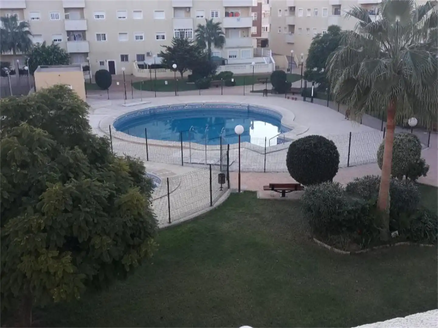 Swimming pool of Flat for sale in Roquetas de Mar  with Air Conditioner, Heating and Private garden