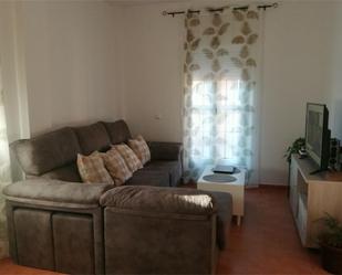 Sala d'estar de Casa adosada en venda en Lepe amb Terrassa, Piscina i Balcó