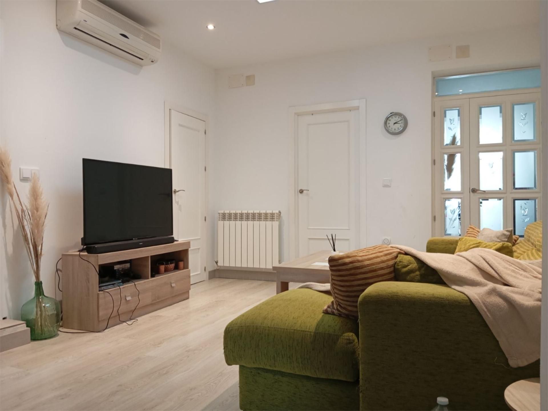 Sala d'estar de Planta baixa en venda en Tomelloso amb Aire condicionat, Calefacció i Terrassa