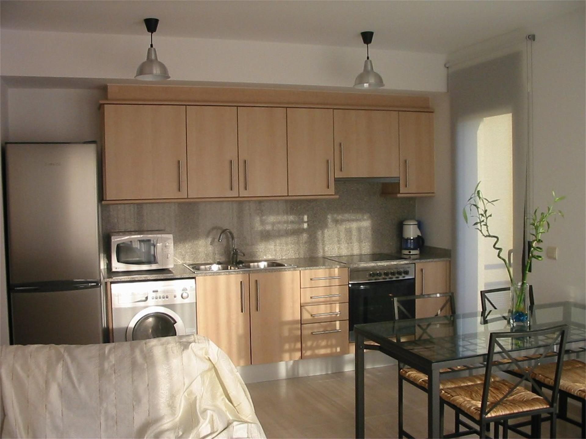Kitchen of Flat for sale in Sant Feliu de Guíxols  with Air Conditioner and Balcony