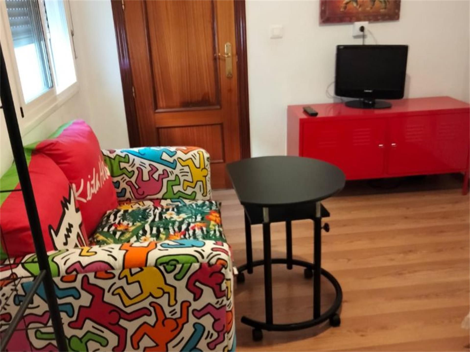 Living room of Flat to share in Cúllar Vega  with Air Conditioner, Terrace and Storage room