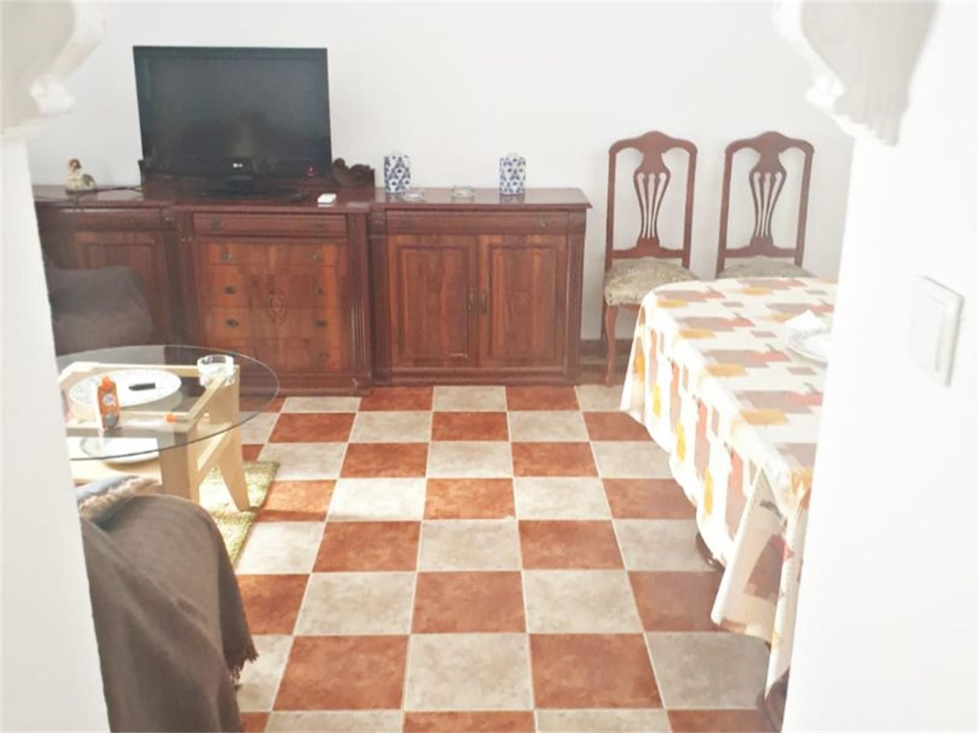 Sala d'estar de Pis de lloguer en El Puerto de Santa María amb Aire condicionat i Moblat