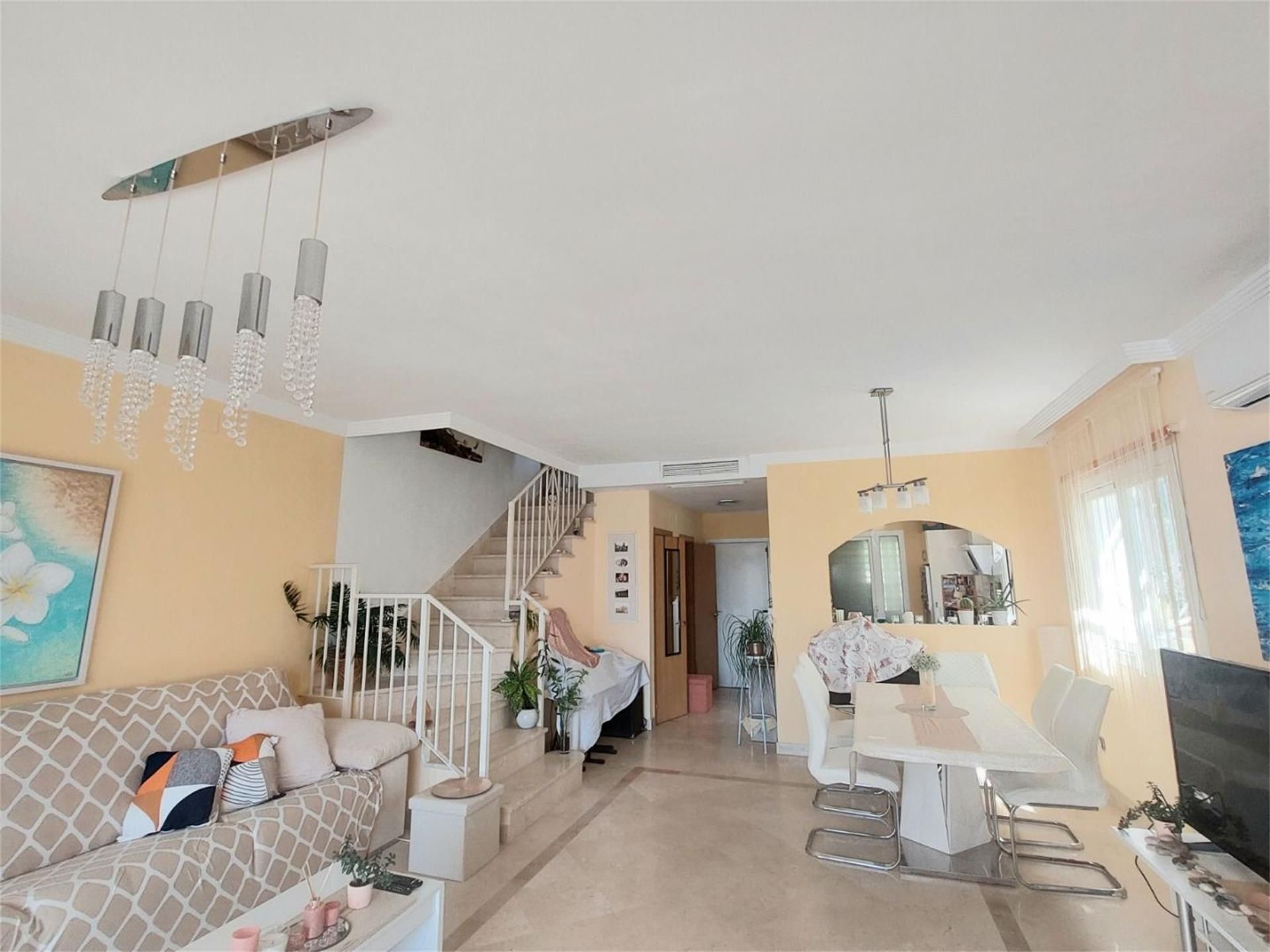 Living room of Duplex for sale in La Alcaidesa  with Air Conditioner, Private garden and Terrace