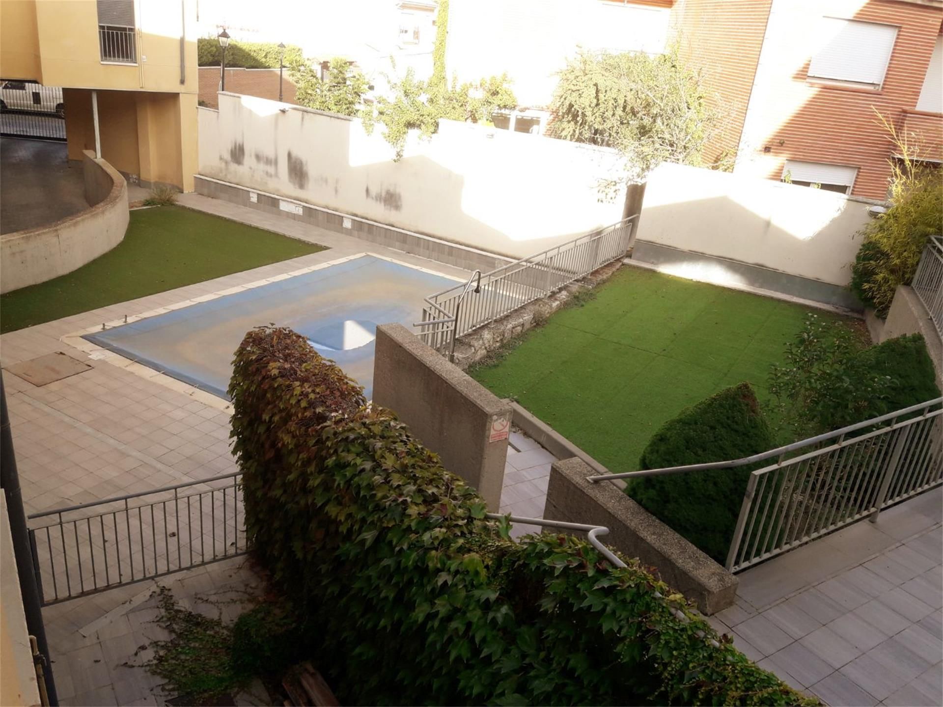 Swimming pool of Duplex for sale in Fuensaldaña  with Heating, Parquet flooring and Storage room