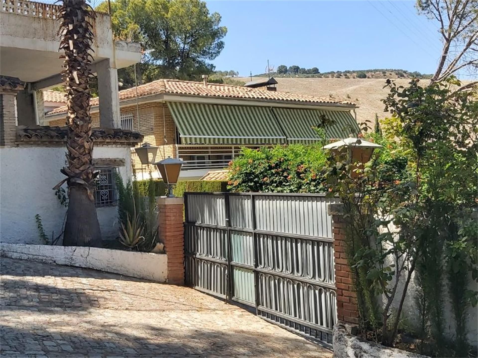 Exterior view of House or chalet for sale in  Jaén Capital  with Air Conditioner, Terrace and Swimming Pool