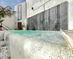 Swimming pool of Single-family semi-detached for sale in Pulpí  with Air Conditioner, Terrace and Swimming Pool