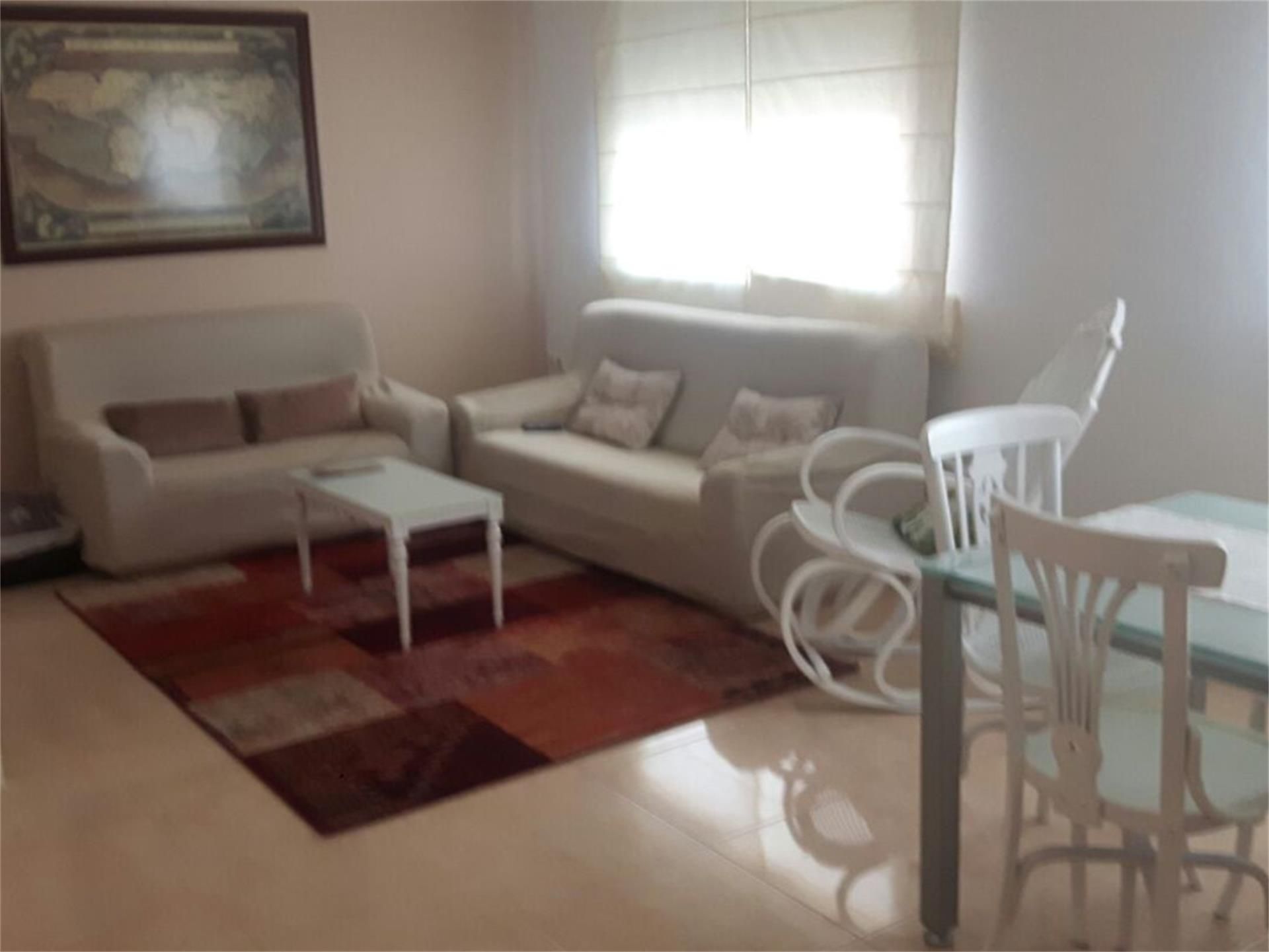 Sala d'estar de Casa adosada en venda en Rafelguaraf