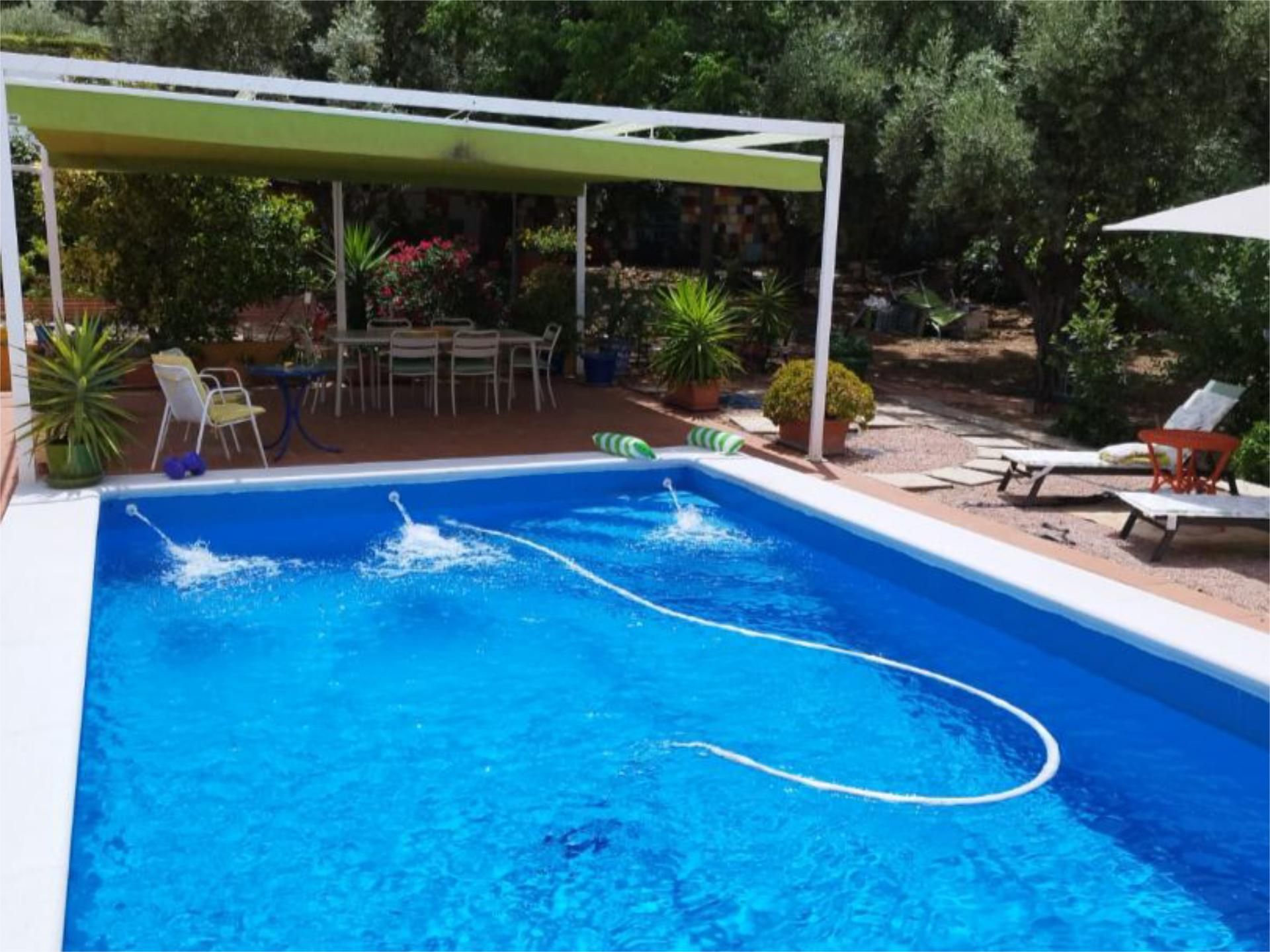 Piscina de Casa o xalet en venda en  Jaén Capital amb Aire condicionat, Calefacció i Jardí privat